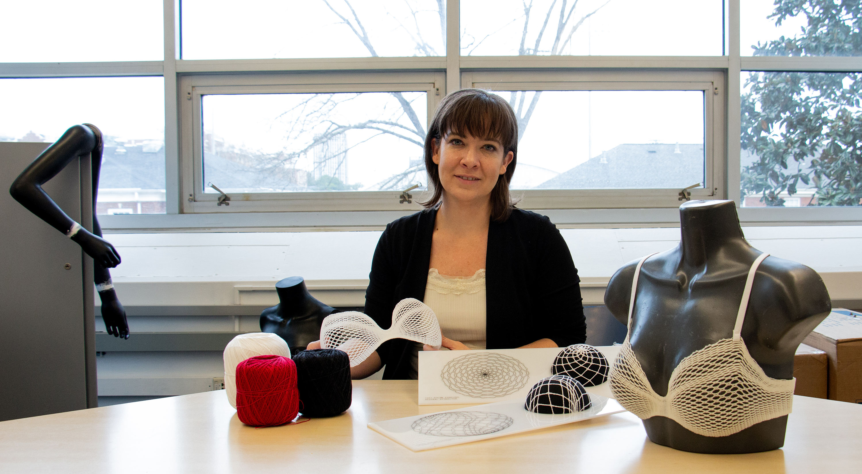 Lisa Marks, assistant professor in the School of Industrial Design, shows off different phases of the Algorithmic Lace project. Credit: Alejandra Nash