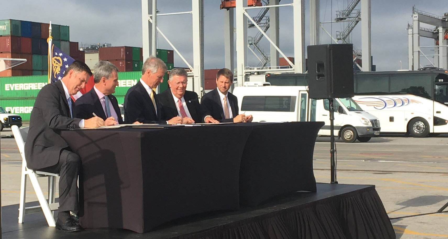 The Georgia Ports Authority, the Georgia Institute of Technology, and the Georgia Center of Innovation for Logistics signed a Memorandum of Understanding (MOU) on Tuesday (July 31) at the Port of Savannah that creates a new relationship aimed at supporting the state’s logistics industry in economic development, research and education. Pictured are from left, Griff Lynch, executive director, Georgia Ports Authority; U.S. Rep. Buddy Carter, R-Georgia; G.P. “Bud” Peterson, Georgia Tech president; Jimmy