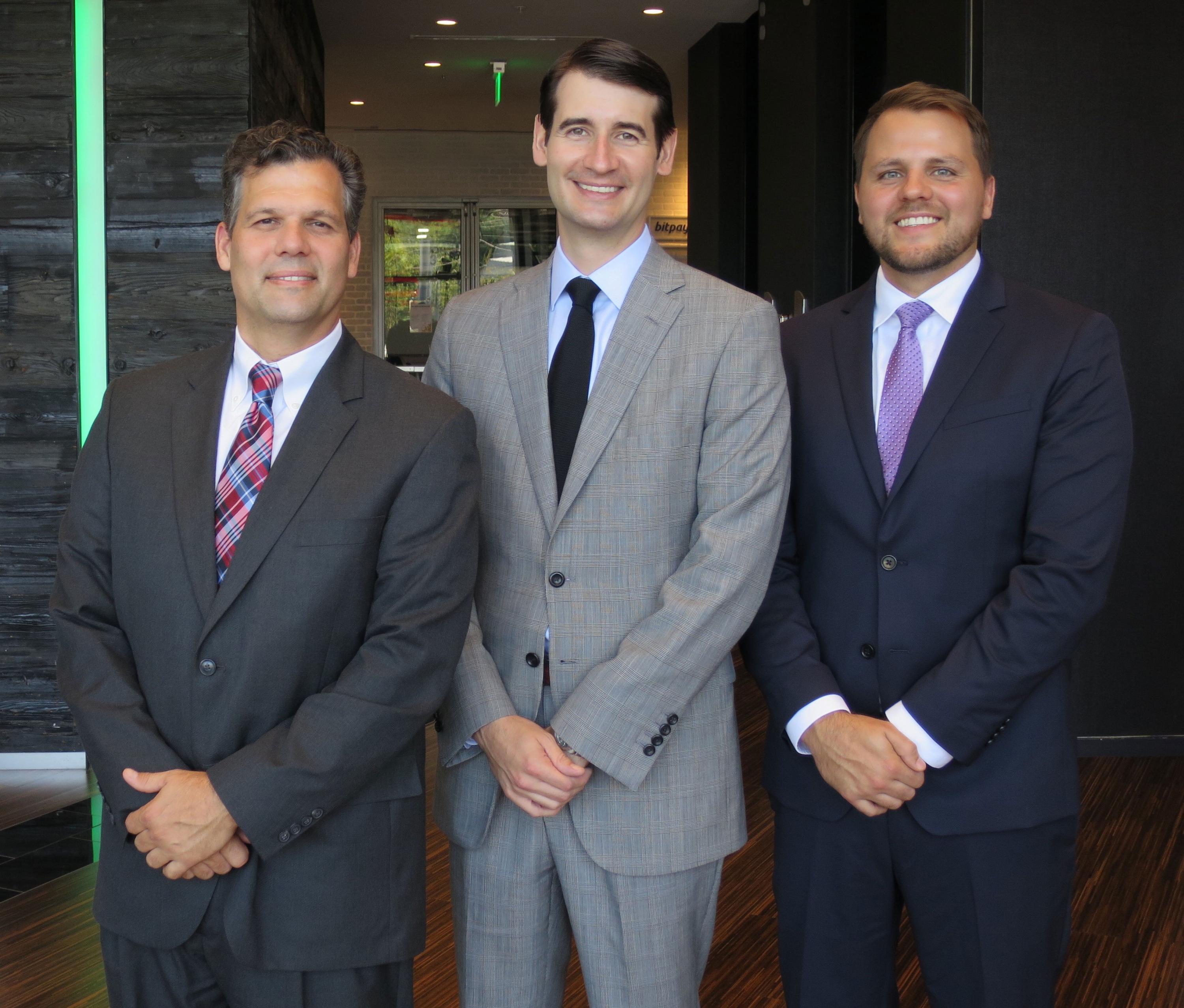 The management team at Micro C, a medical device startup based in Savannah, has developed a comprehensive, hand-held X-ray and digital camera for surgeons and physicians who treat disorders of the extremities. All three are Georgia Tech graduates. From left: Chief Operating Officer Kirby Sisk (BSME, MBA), Chief Executive Officer Evan Ruff (BSCmpE, MBA), and founder and Chief Medical Officer Dr. Greg Kolovich (BSEE, MPH).