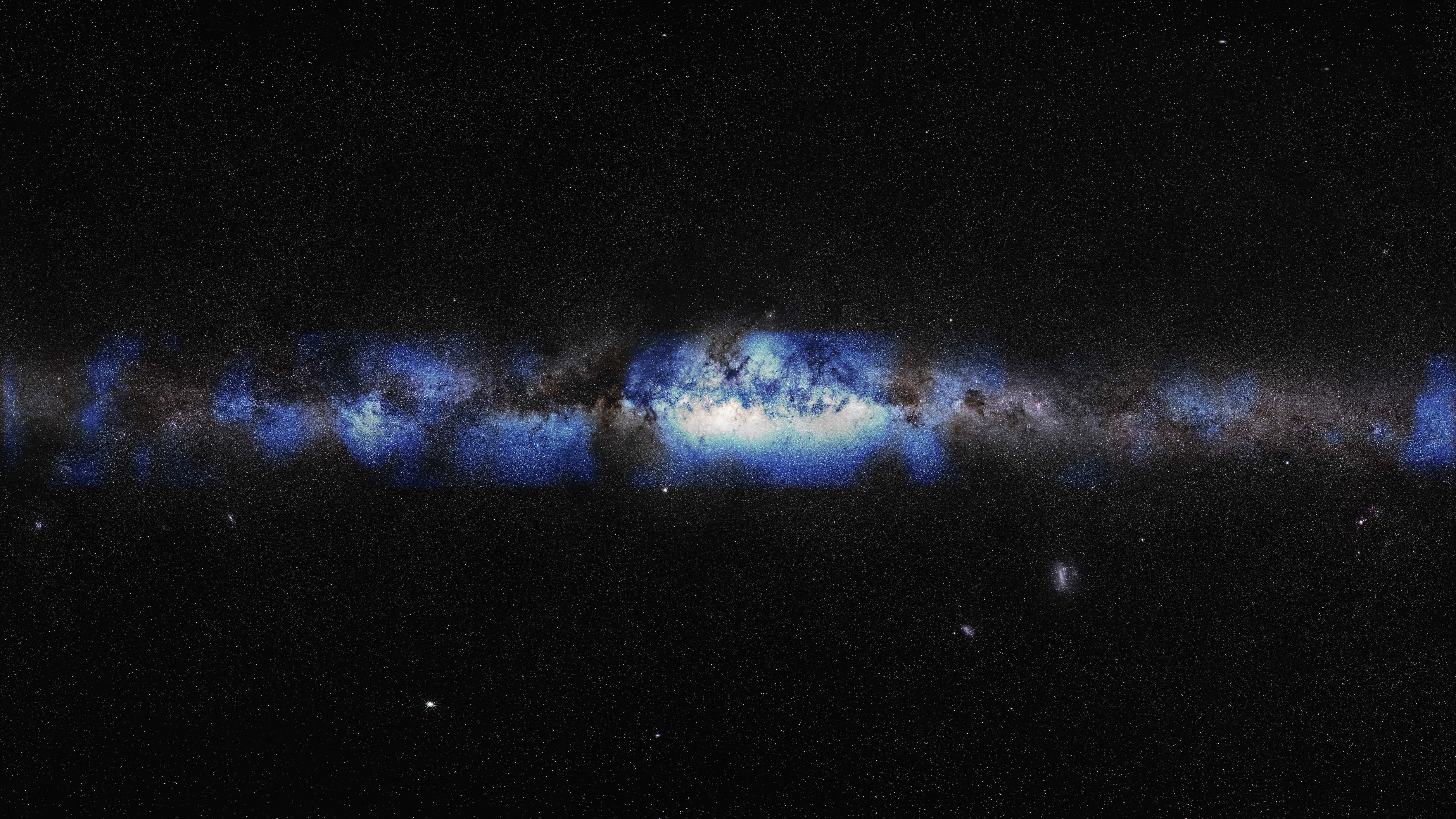 An artist’s composition of the Milky Way seen with a neutrino lens (blue). (IceCube Collaboration/U.S. National Science Foundation (Lily Le &amp; Shawn Johnson)/ESO (S. Brunier))
