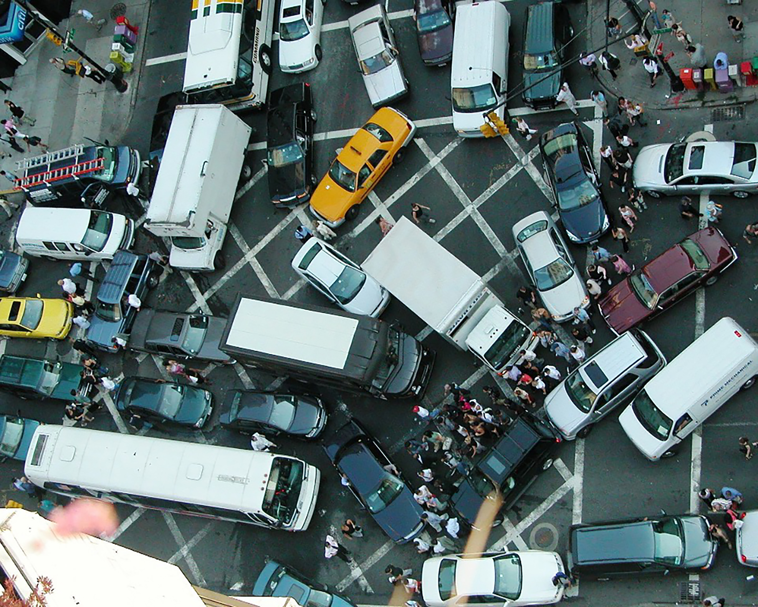 Actual gridlock in Manhattan in 2007.

Credit: Rgoogin at the English Wikipedia [CC BY-SA 3.0 (http://creativecommons.org/licenses/by-sa/3.0/)]