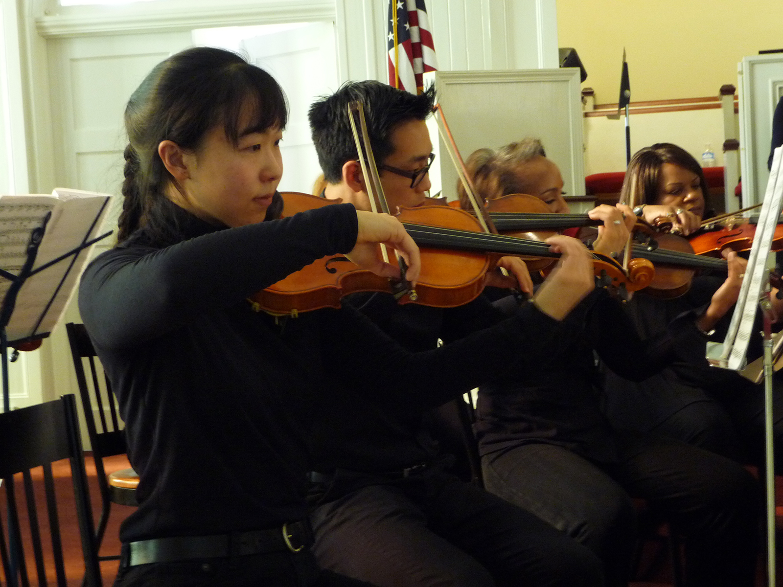 Iris Tien plays the violin with the Atlanta Musicians Orchestra.