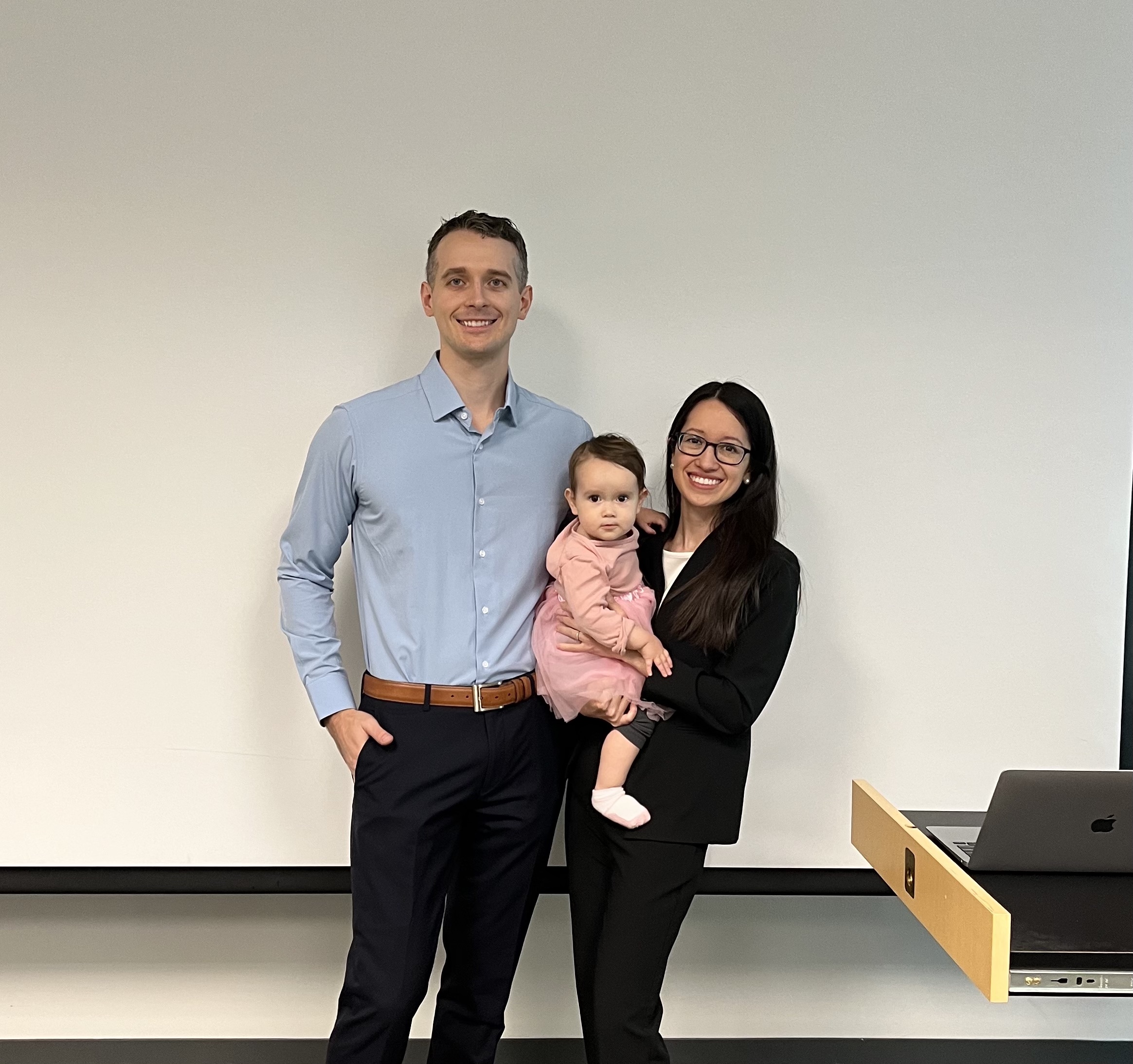 Midori Wasielewski with her husband, Andrew, and their daughter following her dissertation defense. 