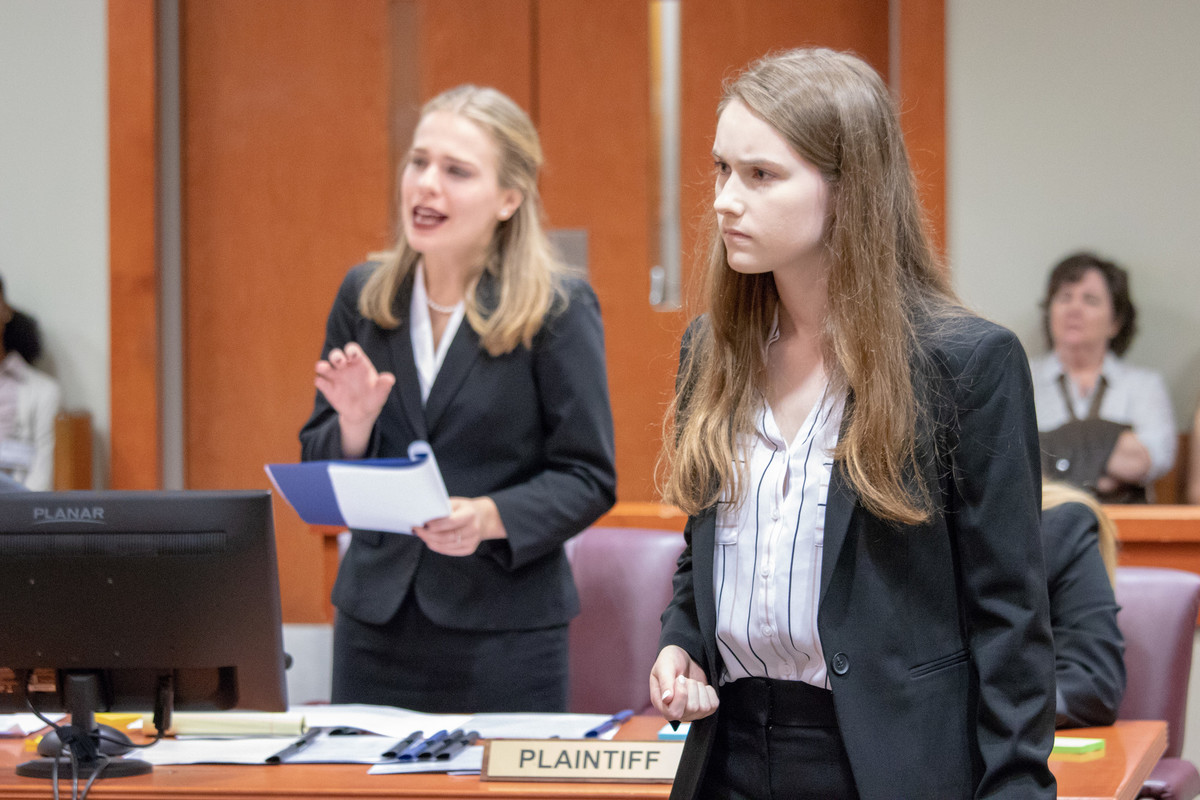 Drawing on a strong tradition of interdisciplinary education and a student body who knows what it means to work hard, Georgia Tech's mock trial team — housed in the Ivan Allen College of Liberal Arts — ranks among the nation’s best. Here, competitor Katie Burdette (CE, Cincinnati), foreground, responds to a judge's question during cross-examination of a witness during a trial round at the University of Georgia Mock Trial Tournament at the DeKalb County Courthouse in Decatur, Ga., on Oct. 20, 2018.