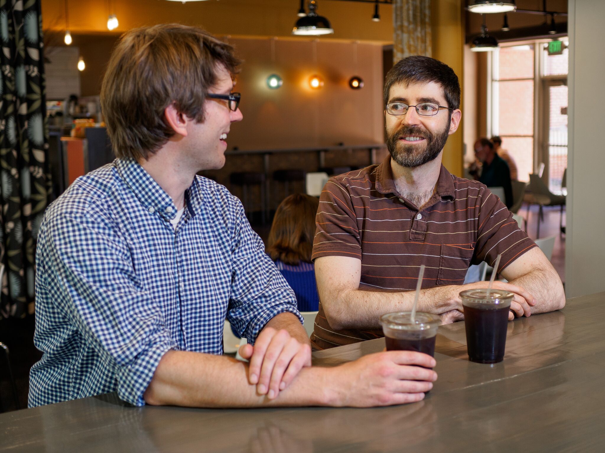 Researchers Will Ratcliff (left) and Peter Yunker at Highland Bakery.