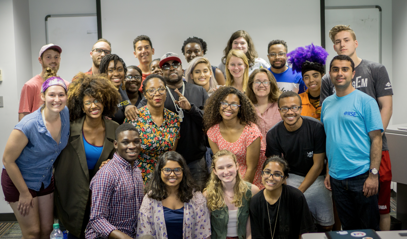 Students from Dr. Joycelyn Wilson's class about Outkast and Trap Music meet with Big Boi (Antwan Patton) from Outkast to wrap up their semester of study.