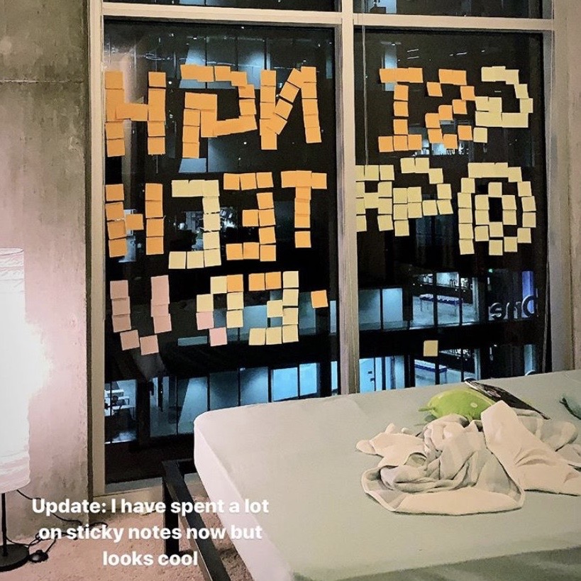 A computer science student used sticky notes in his apartment window to message back and forth with executives at a neighboring company's headquarters.