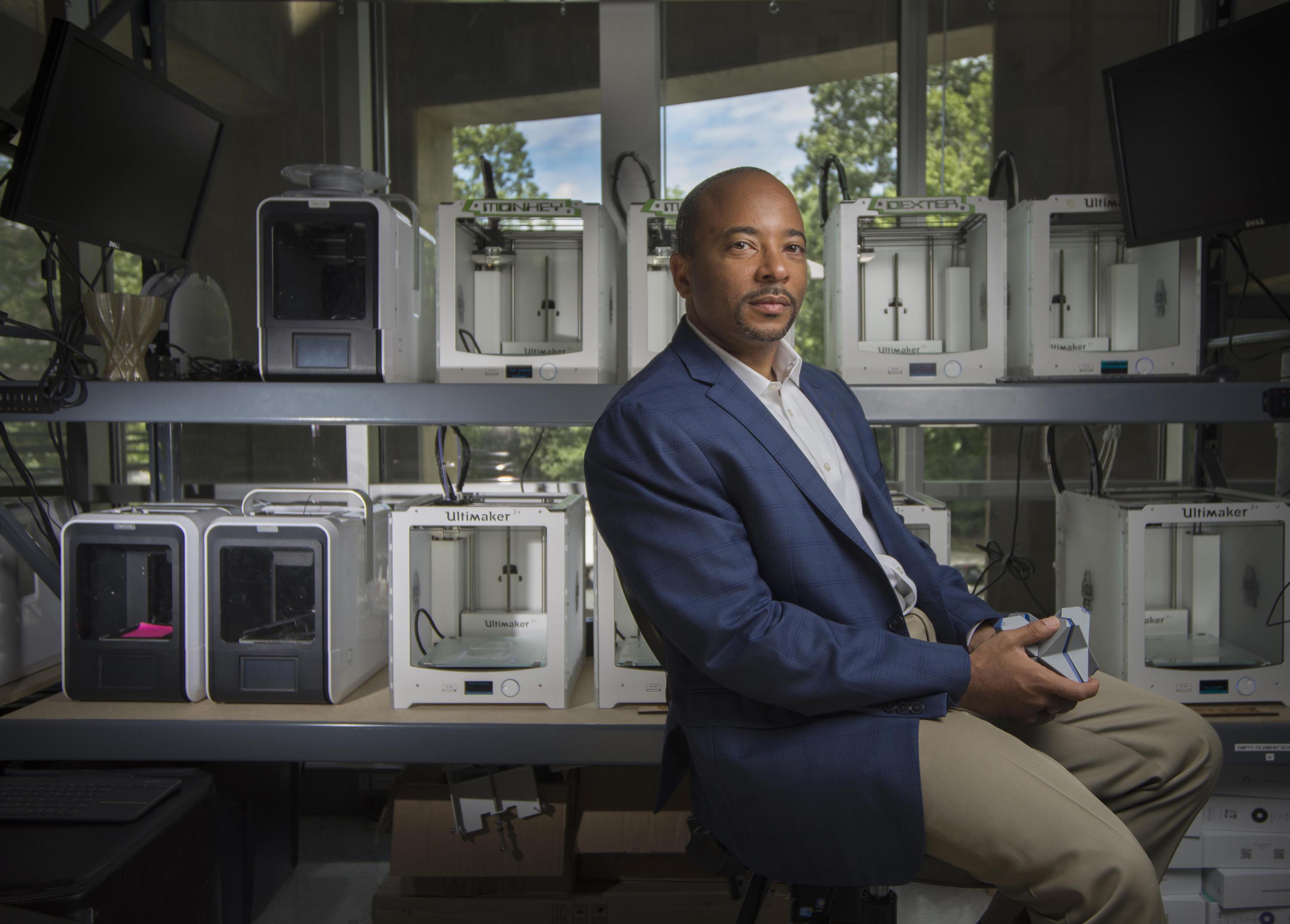 Raheem Beyah, the Motorola Foundation Professor and associate chair in Georgia Tech’s School of Electrical and Computer Engineering, is shown in a 3-D printing lab at the Woodruff School of Mechanical Engineering. (Credit: Christopher Moore, Georgia Tech)