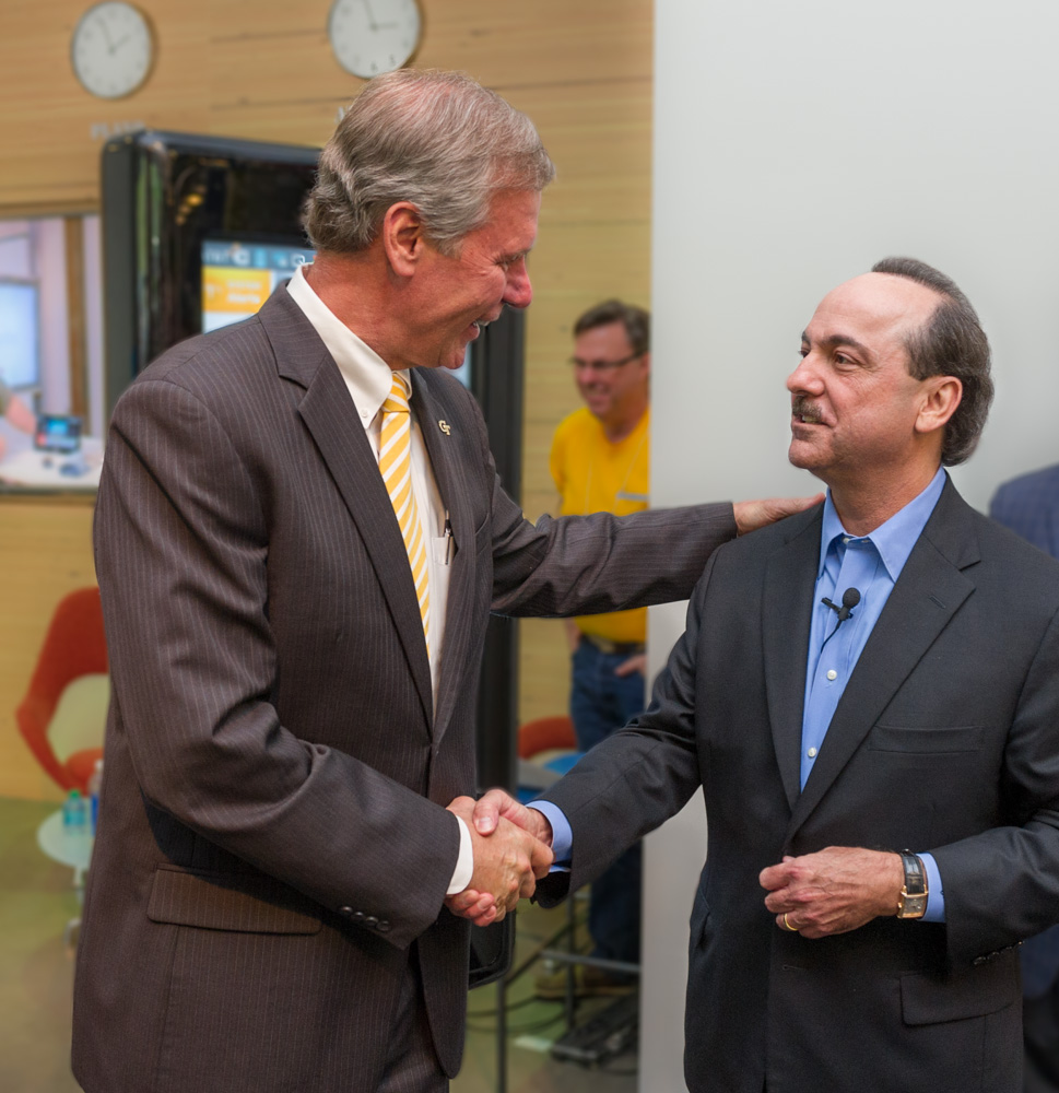 Georgia Tech Georgia Tech President G.P. “Bud” Peterson (left) greets Ralph de la Vega, president and CEO of AT&T Mobility, at the opening of the AT&T Foundry that opened Tuesday in Technology Square. (Georgia Tech Photo: Rob Felt)