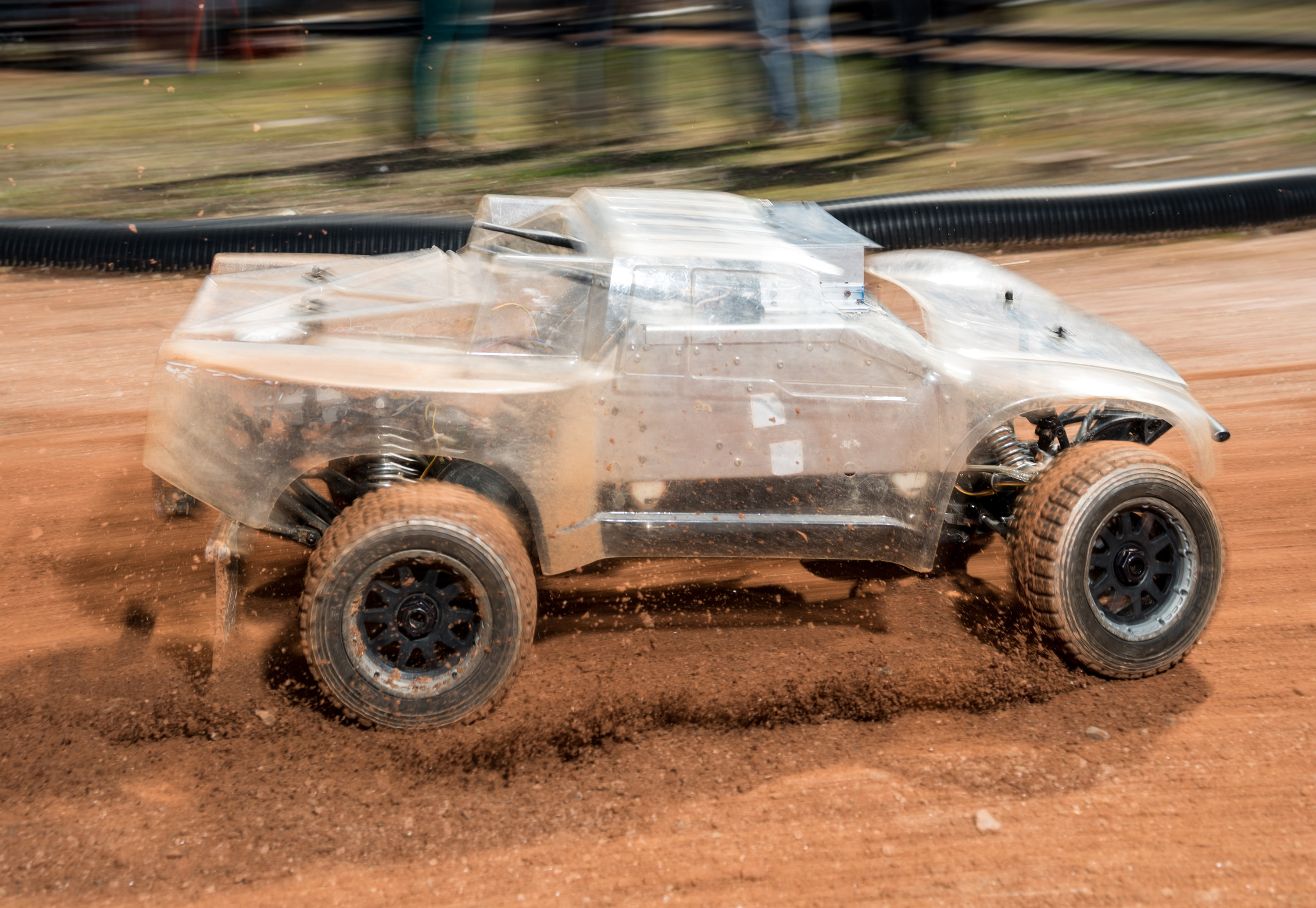 At the Georgia Tech Autonomous Racing Facility, researchers are studying a one-fifth-scale autonomous vehicle as it traverses a dirt track. The work will help the engineers understand how to help driverless vehicles face the risky and unusual road conditions of the real world. (Credit: Rob Felt, Georgia Tech)