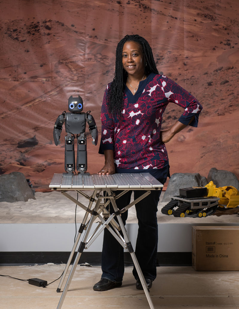 Ayanna Howard, the two studies' principal investigator. Here, for a past study, she is using a socially engaging robot to interact with children who are having difficulty with mathematics. The robot uses knowledge from real teachers to help children with common math problems. Georgia Tech / Rob Felt