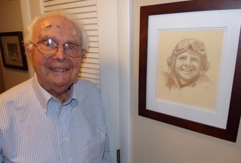 Floyd Franklin Blair with a photo of himself