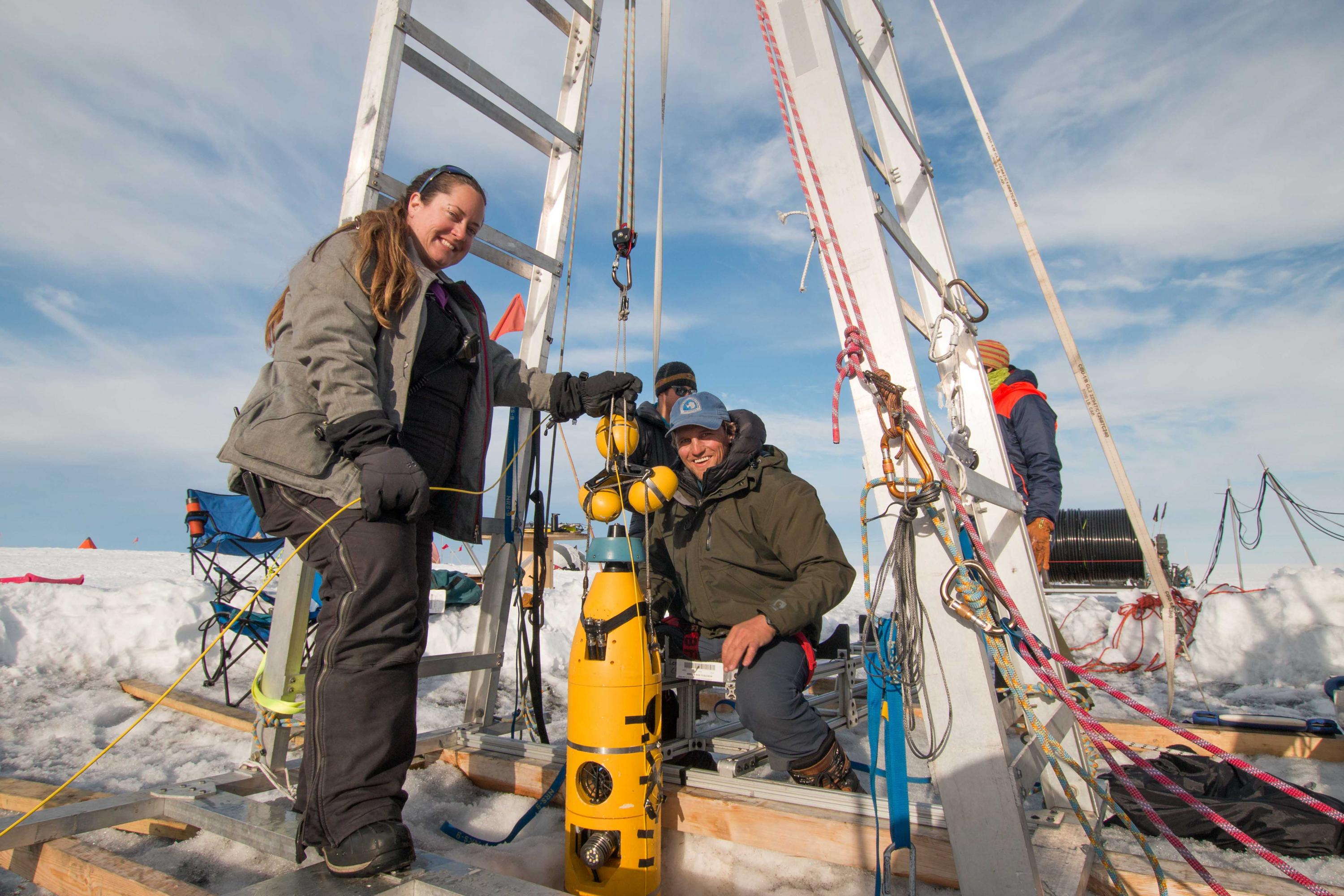  

ITGC researchers Britney Schmidt (l.) and Andy Mullen retrieve the robotic submarine Icefin after its last dive to the seafloor foundations of Thwaites Glacier. Icefin was engineered in Schmidt's lab at Georgia Tech. Credit: International Thwaites Glacier Collaboration / Georgia Tech-Schmidt / Dichek