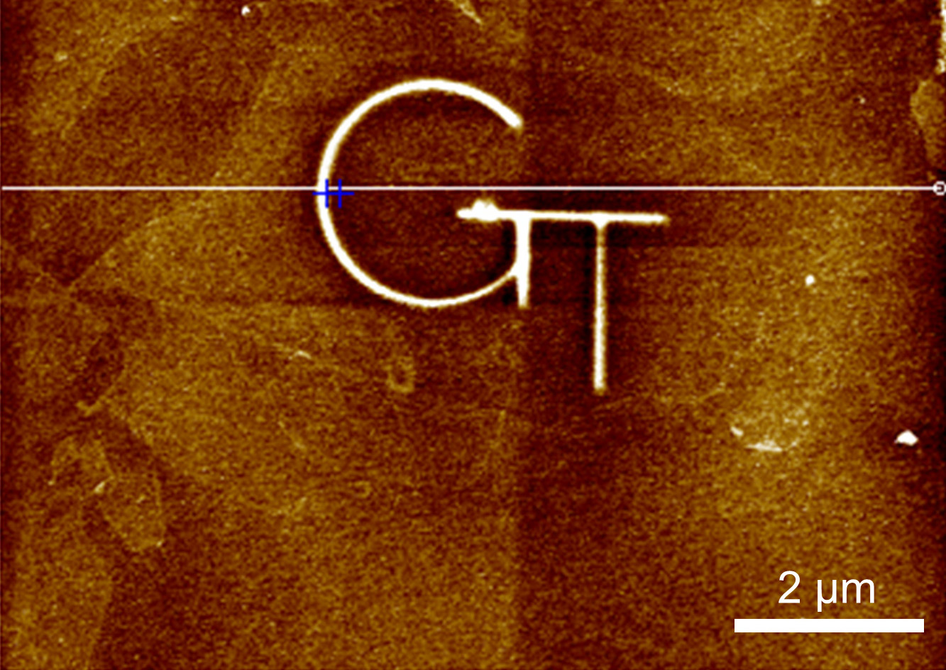 Image shows the deposition of carbon on a graphene oxide surface to create a raised logo with a height of 2.5 nanometers. 