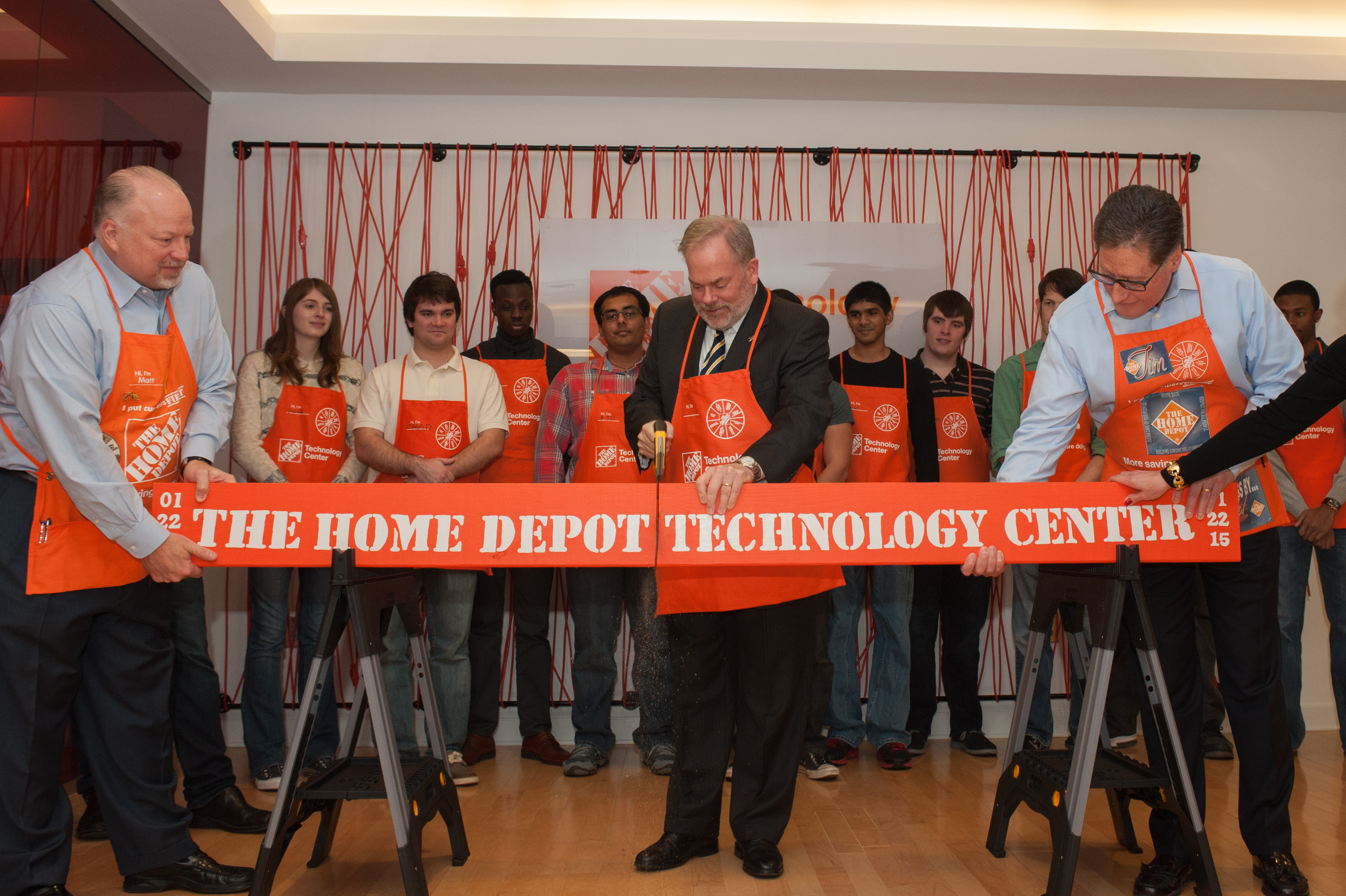 Georgia Tech Executive Vice President for Research Stephen E. Cross participates in the "Board Cutting Ceremony" that officially opens The Home Depot Technology Center in Tech Square.