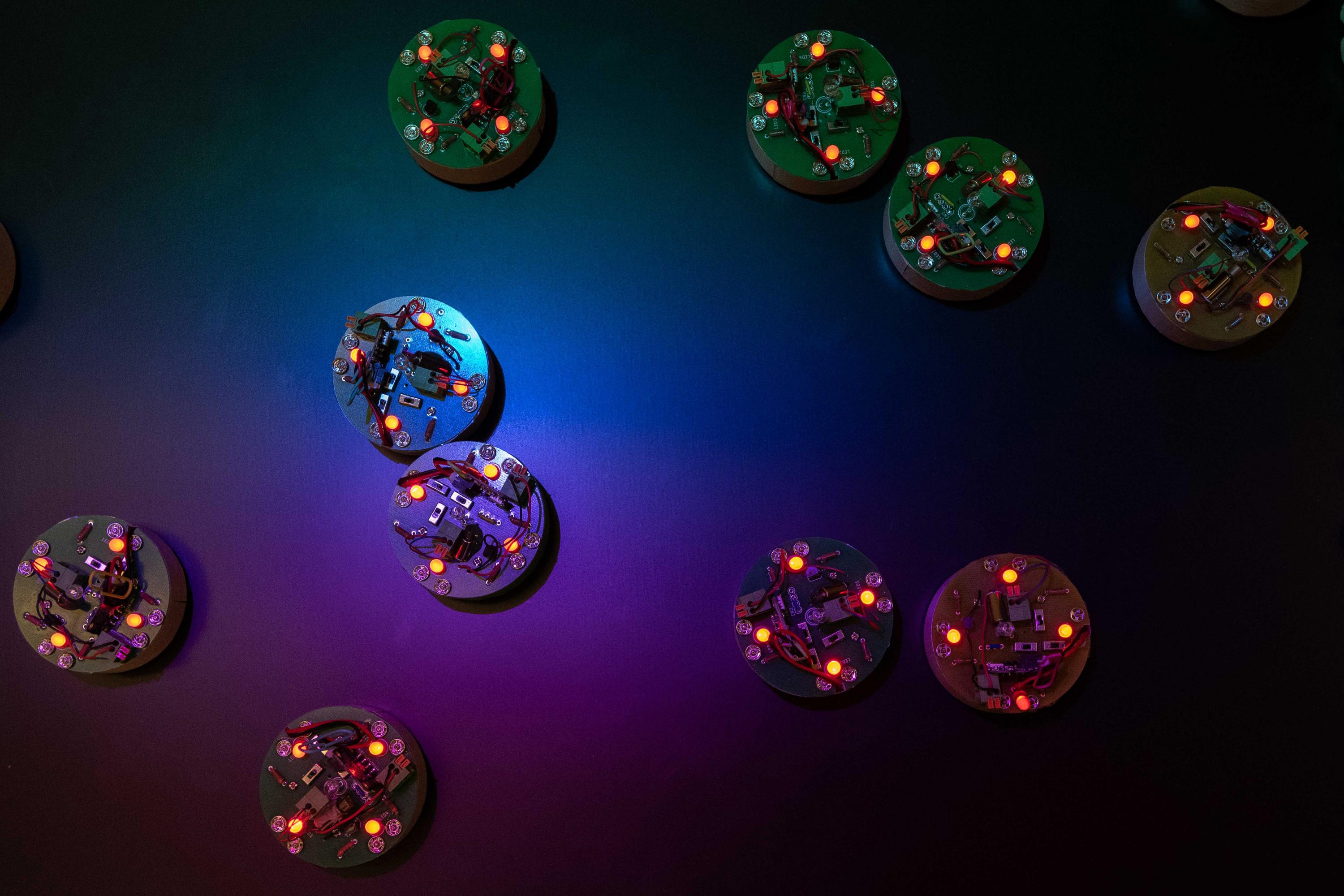 The collective emergent dynamics of these simple robots mimic ferromagnetic materials in different equilibrium states. (Photo: Allison Carter, Georgia Tech)