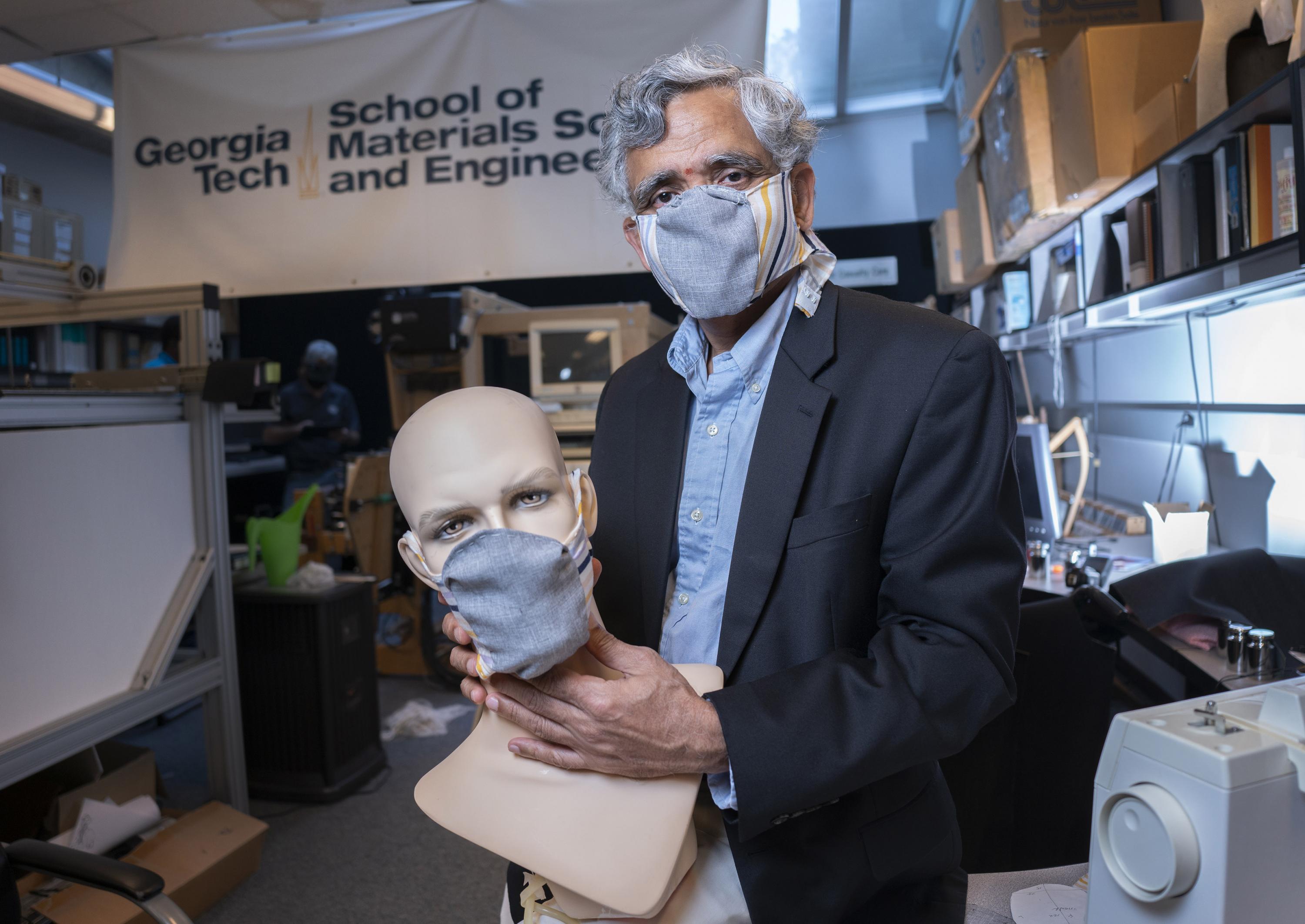 Georgia Tech professor Sundaresan Jayaraman with prototypes of the redesigned face mask. (Credit: Christopher Moore, Georgia Tech)