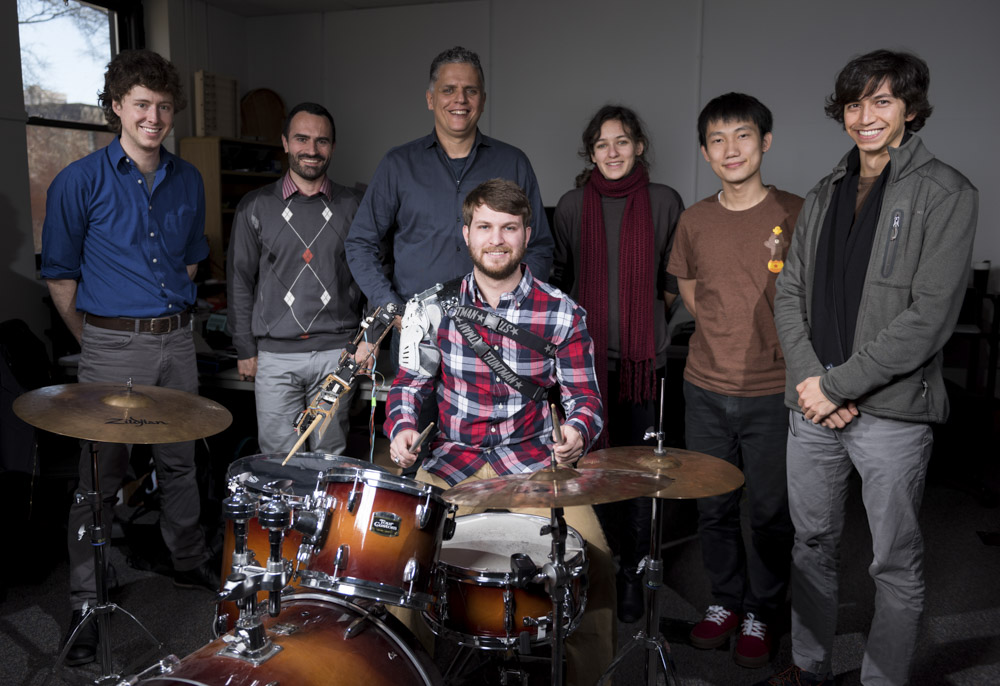 The research team that built the device. Left to right: Mike Winters, Roozbeh Khodambashi, Professor Gil Weinberg, Tyler White (seated), Lea Ikkache, Hua Xiao and Mason Bretan 