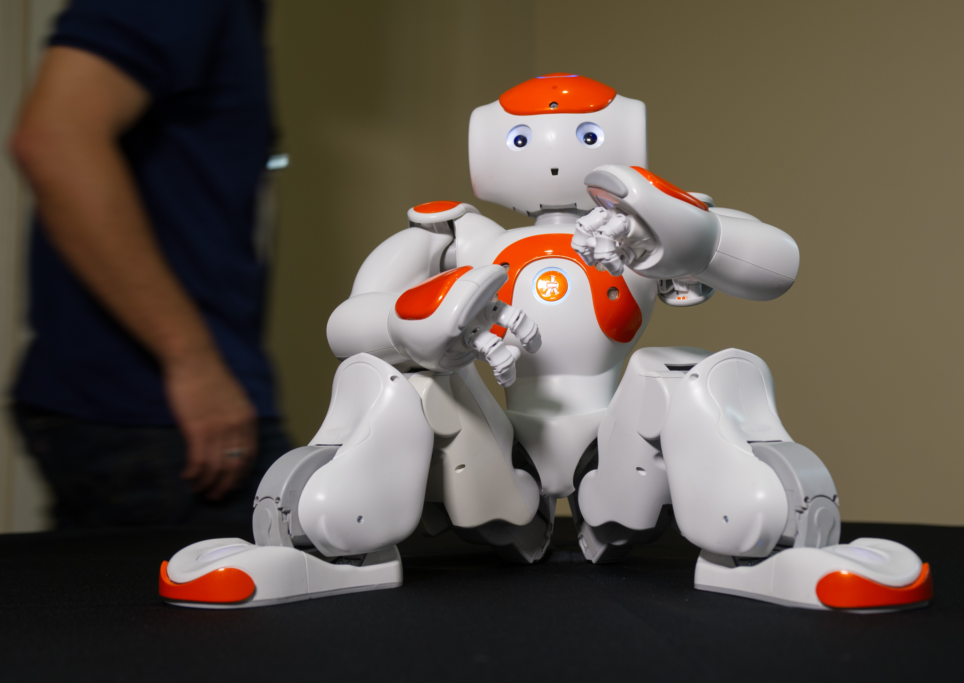NAO is a progammable humanoid with 25 degrees of freedom. It can dance, talk and stand up on its own. It is on display at Georgia Tech during the Humanoids 2013 conference.