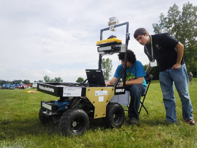 Students from RoboJackets work on the robot they used in the 2013 International Ground Vehicle Competition. They'll enter a new robot into the 2014 competition.