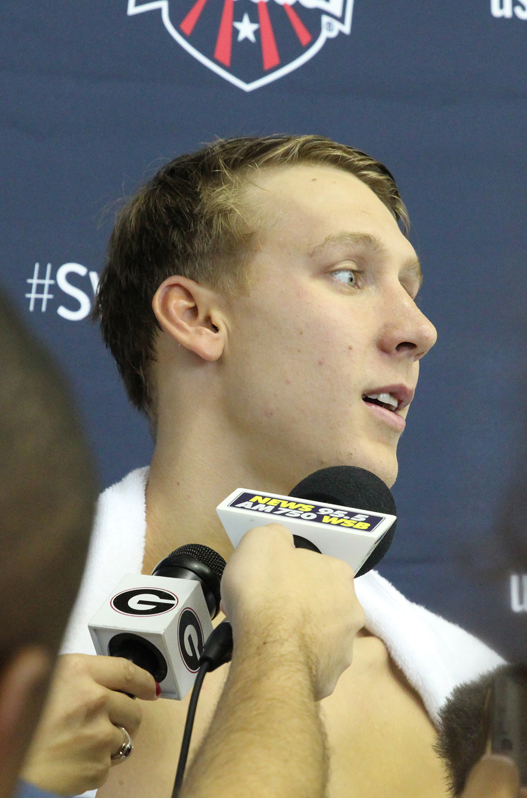Chase Kalisz talks with media following an open practice session at Georgia Tech's McAuley Aquatic Center on July 30, 2016