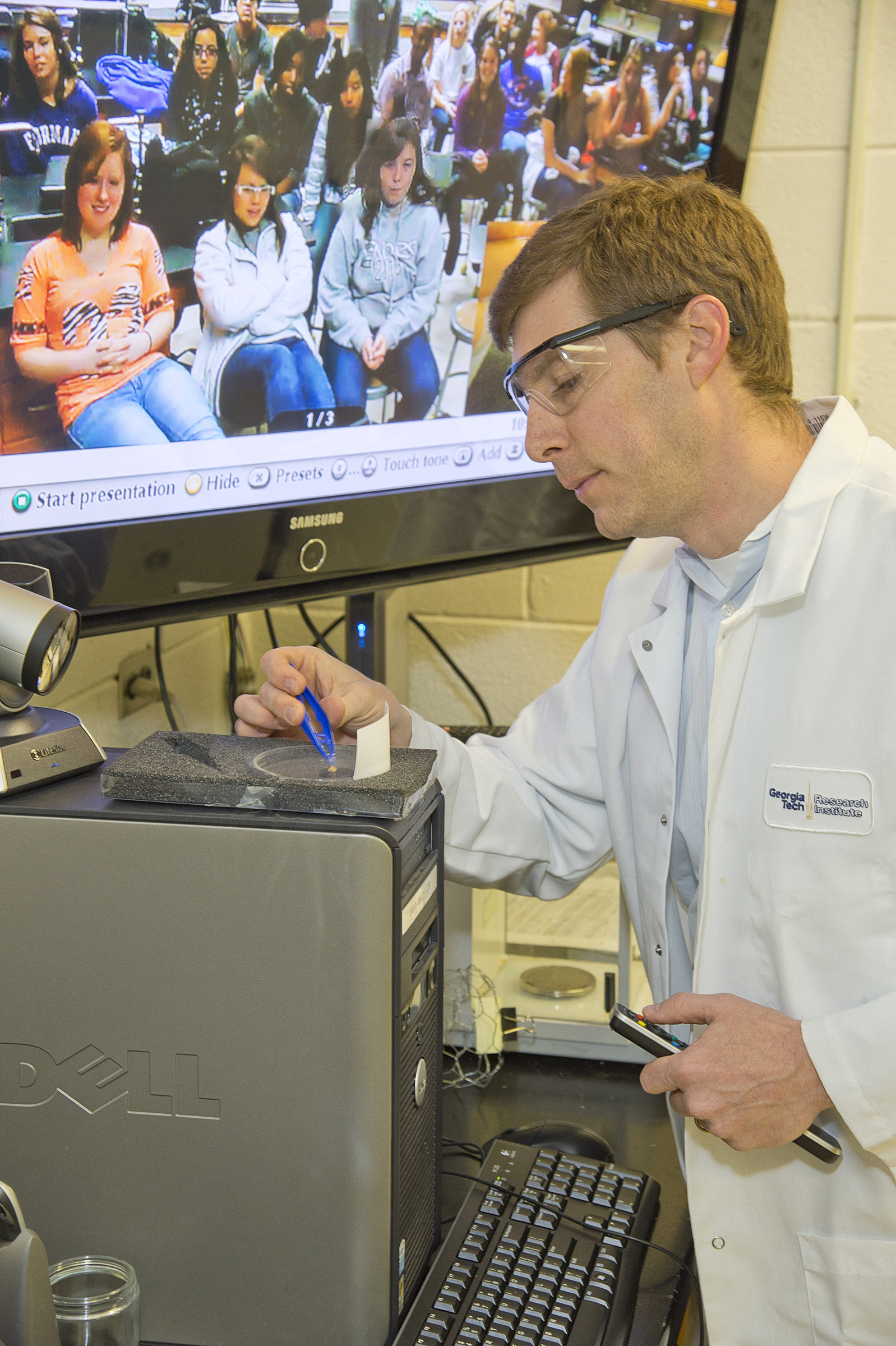 Using a videoconferencing system, principal research engineer Jud Ready teaches a lesson on growing carbon nanotubes as part of GTRI’s Direct-to-Discovery program. (Georgia Tech Photo: Tony Benner)