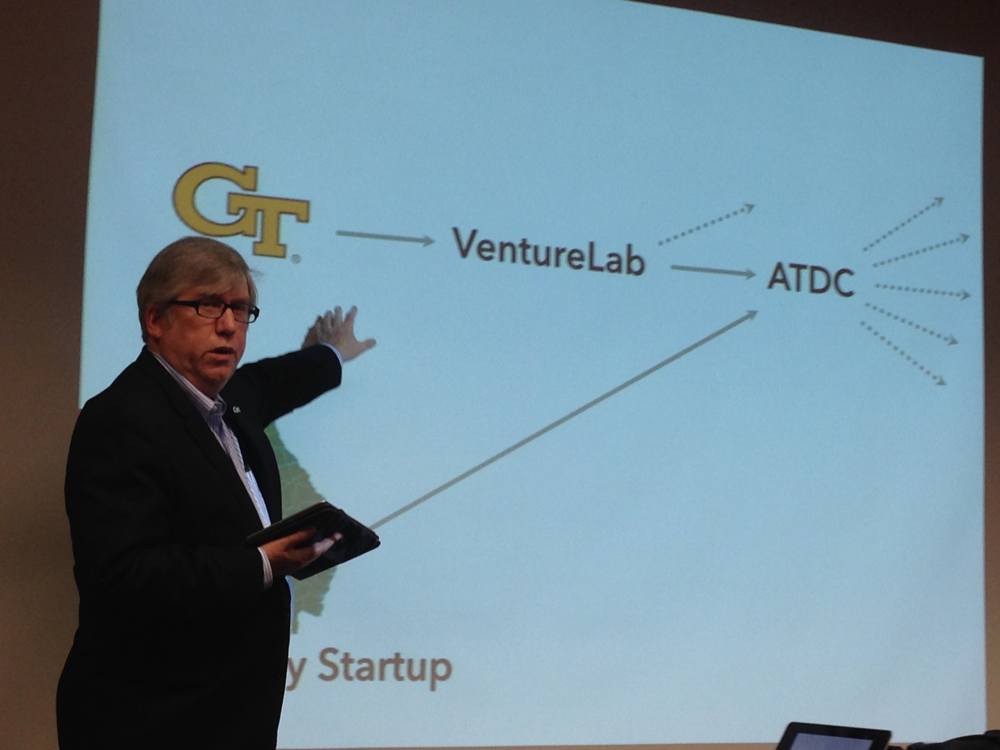 Keith McGreggor, director of VentureLab at Georgia Tech's Enterprise Innovation Institute, discusses customer discovery in a presentation at the Georgia Tech Manufacturing Institute on Oct. 13, 2014. McGreggor was recently selected to teach scientist-entrepreneurs on commercializing their innovations faster in a pilot program the National Institutes of Health launched this month. [Photo credit: Péralte C. Paul]
