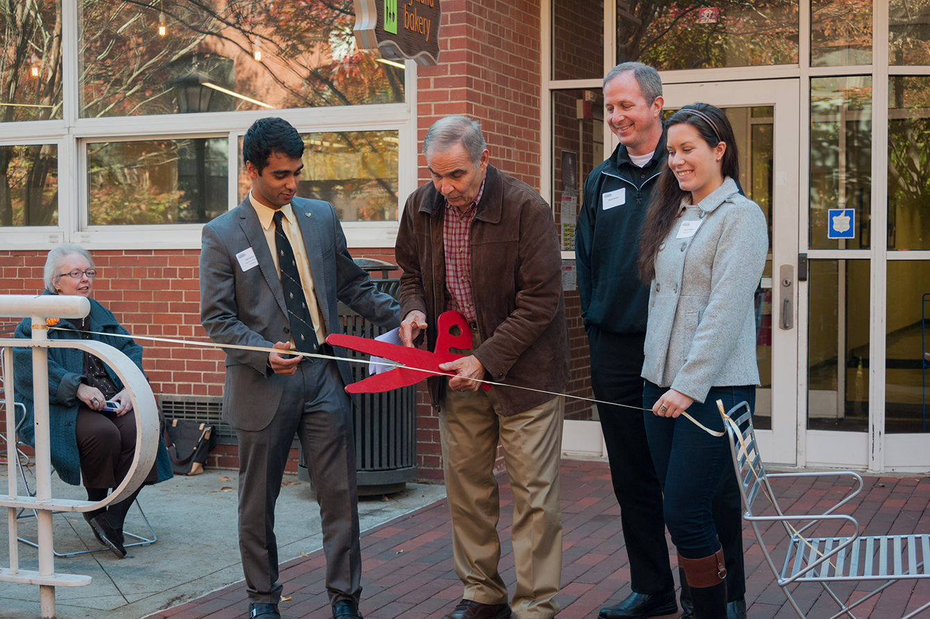 Tommy Klemis cuts the ribbon to the new Klemis Kitchen, which will provide food to Tech students in need. 