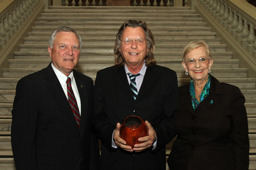 Thomas Lux receives a Governors Award in the Arts Humanities from Georgia Governor Nathan Deal. Mrs. Deal also pictured. Photos courtesy Alana Joyner.