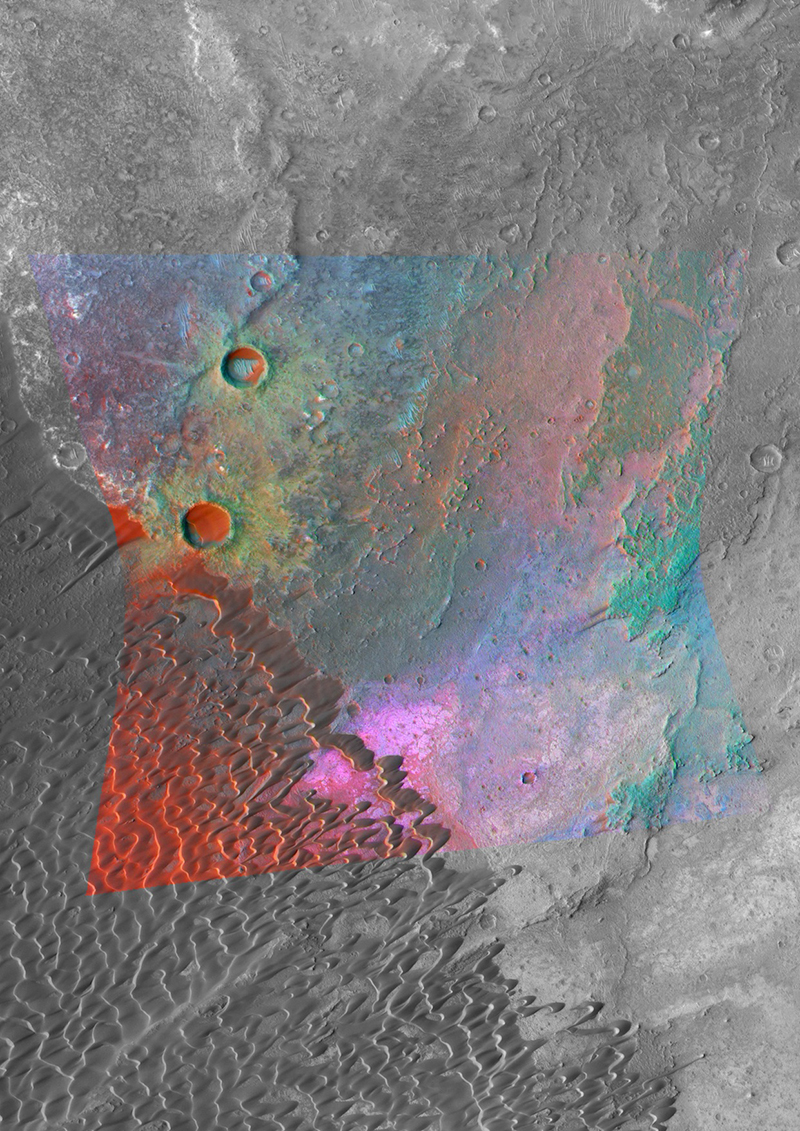 NASA's Mars Reconnaissance Orbiter is providing new spectral "windows" into the diversity of Martian surface materials. Here in a volcanic caldera, bright magenta outcrops have a distinctive feldspar-rich composition. Credit: NASA/JPL/JHUAPL/MSSS.