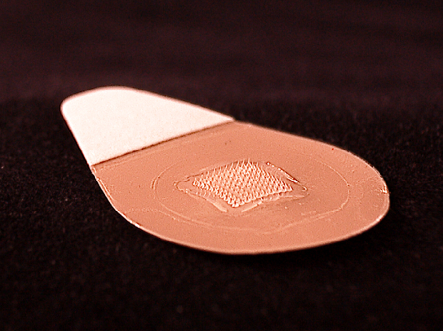 This close-up image shows the microneedle vaccine patch, which contains tiny needles that dissolve into the skin, carrying vaccine. A majority of study participants said they would prefer to receive the influenza vaccine using patches rather than traditional hypodermic needles.