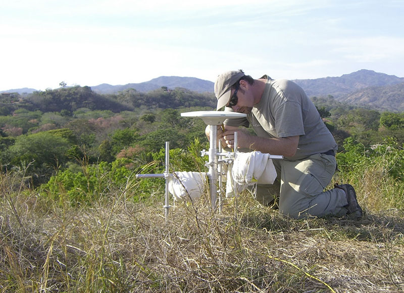 Andrew Newman, an associate professor in the School of Earth and Atmospheric Sciences at the Georgia Institute of Technology, performs a GPS survey in Costa Rica's Nicoya Peninsula in 2010. Credit: Lujia Feng.