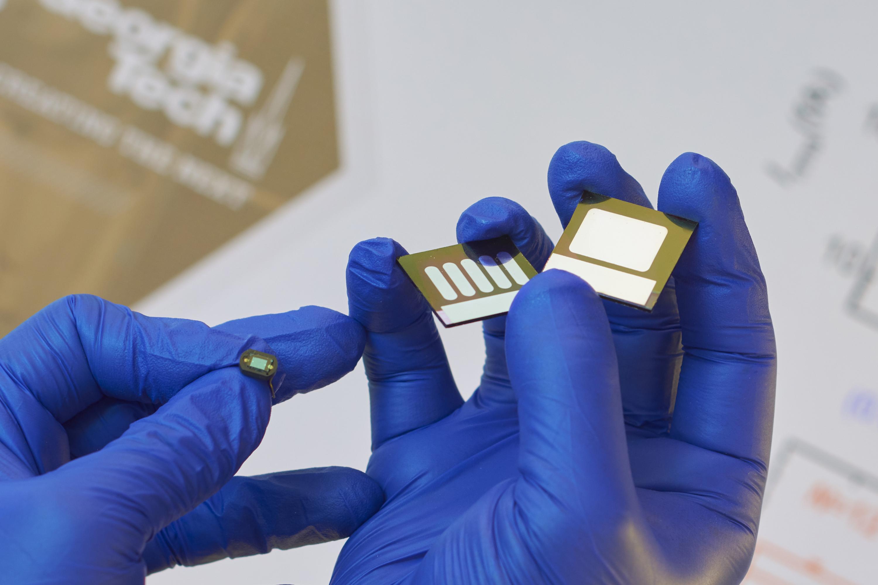 Organic photodiodes can be much larger than their silicon counterparts. On the left is a silicon photodiode compared to two large-area organic photodiodes. (Credit: Canek Fuentes-Hernandez, Georgia Tech)