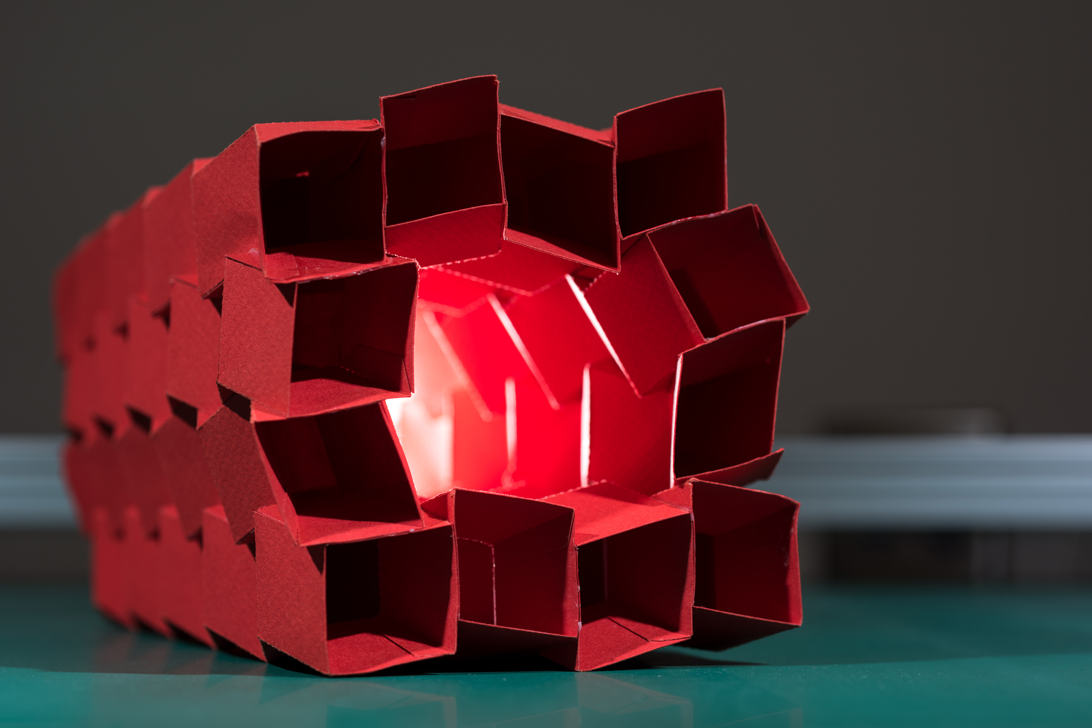 This origami structure is composed of 12 interlocking tubes that can fold flat for easy transportation. (Credit: Rob Felt, Georgia Tech)