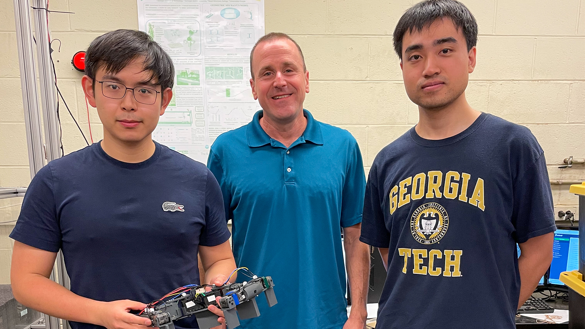 Baxi Chong, Daniel Goldman, and Tianyu Wang with the lizard robophysical model