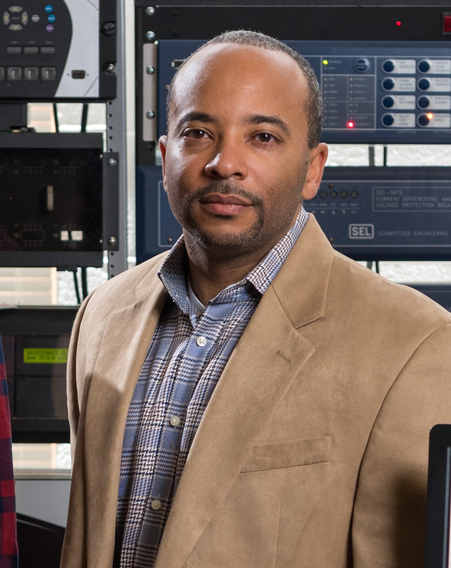 A study of cloud hosting services has found that as many as 10 percent of the repositories hosted by them have been compromised. Shown is Georgia Tech professor Raheem Beyah, who led the research. (Credit: Rob Felt, Georgia Tech)