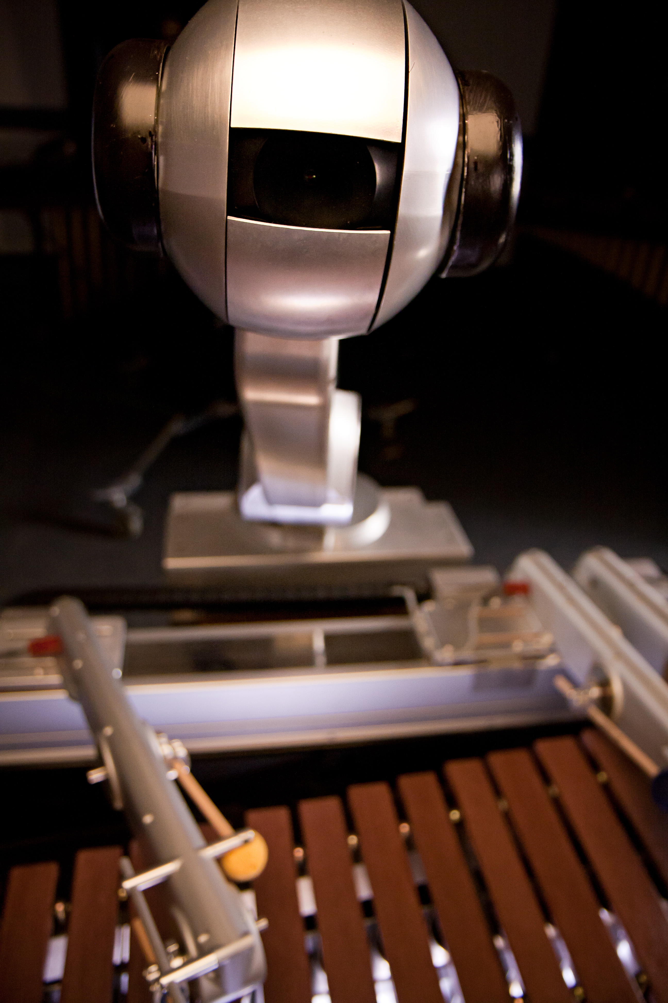 Shimon is an improvising robotic marimba player that is designed to create meaningful and inspiring musical interactions with humans, leading to novel musical experiences and outcomes.