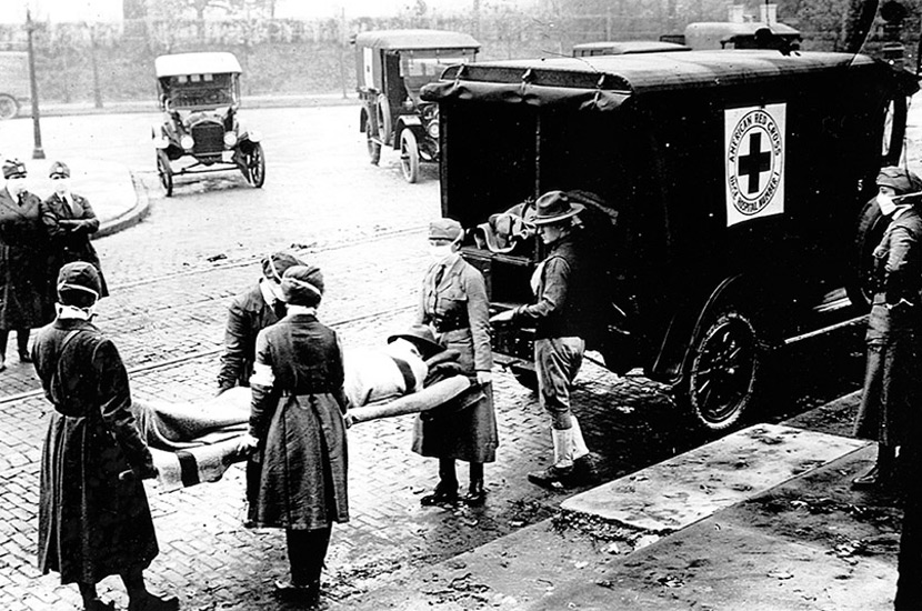 An ambulance in St. Louis, Missouri, picks up a patient believed to be infected with influenza in the 1918-19 Spanish flu pandemic, which killed 50 million people or more worldwide. Credit: National Archives