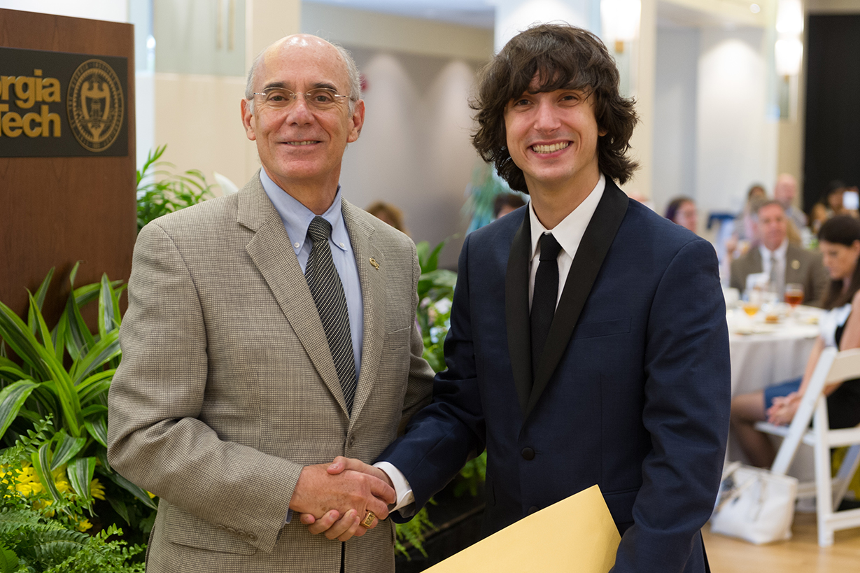 Provost Rafael L. Bras and Adam Ledoux, a computational media major and winner of the 2015 Love Family Foundation Scholarship. This scholarship is the highest award for a graduating senior at Georgia Tech.  