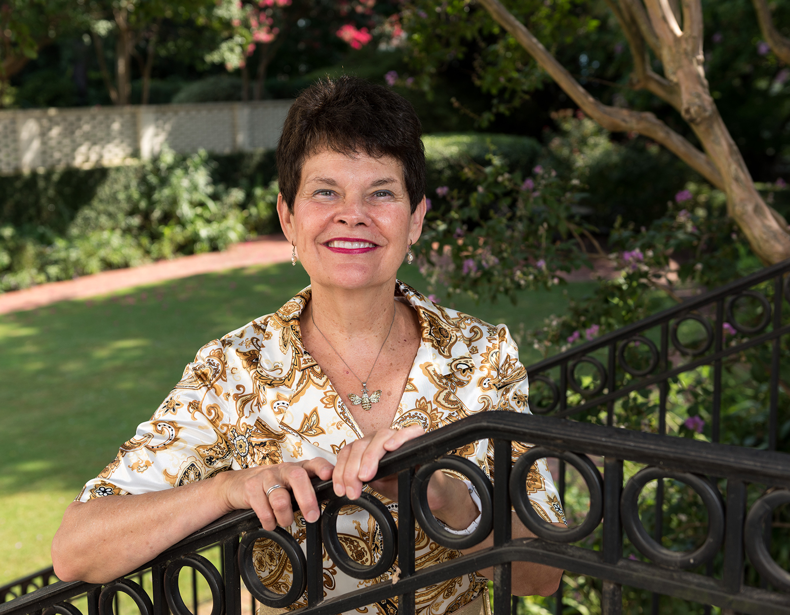 Val Peterson has been first lady of Georgia Tech for seven years. In the President’s Residence on 10th Street, the Petersons have many family photos, including their foster children. 