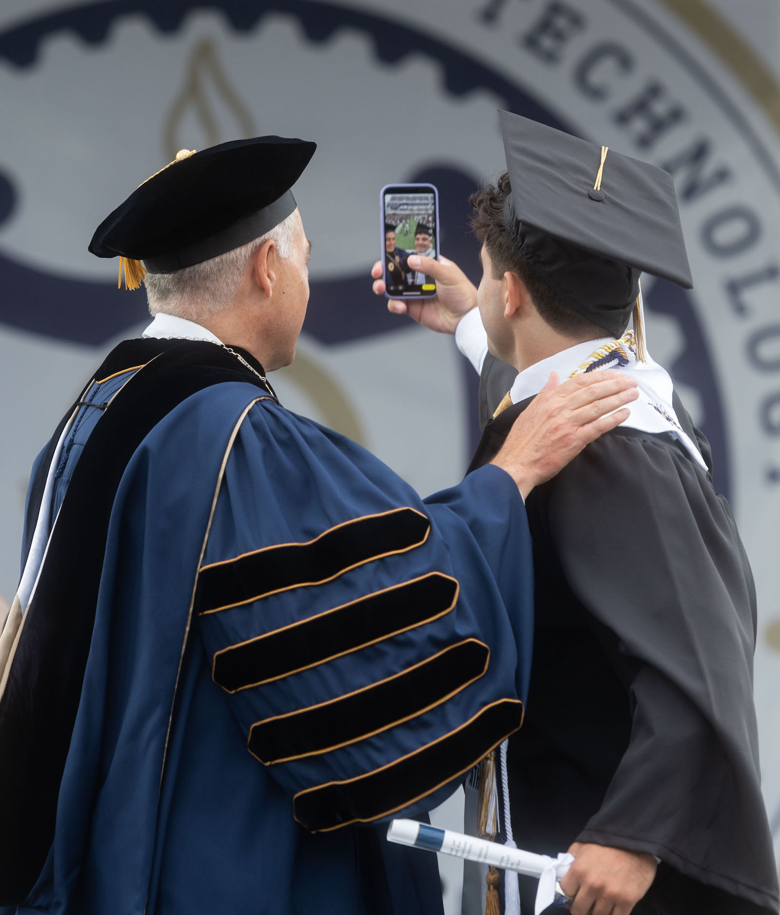 bachelor's ceremony, selfie with President Cabrera