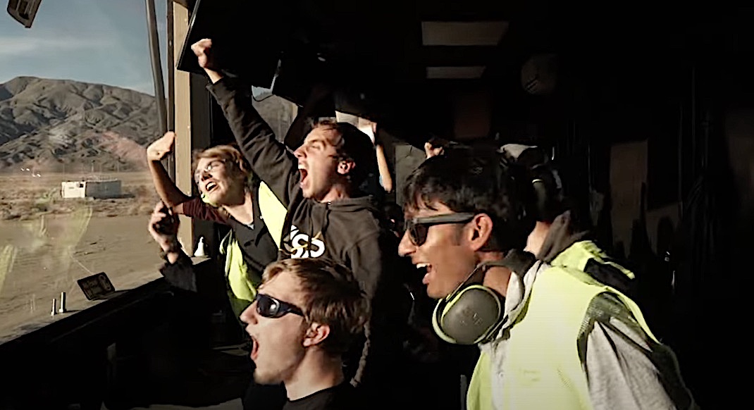 YJSP crew celebrates their launch from mission control. 