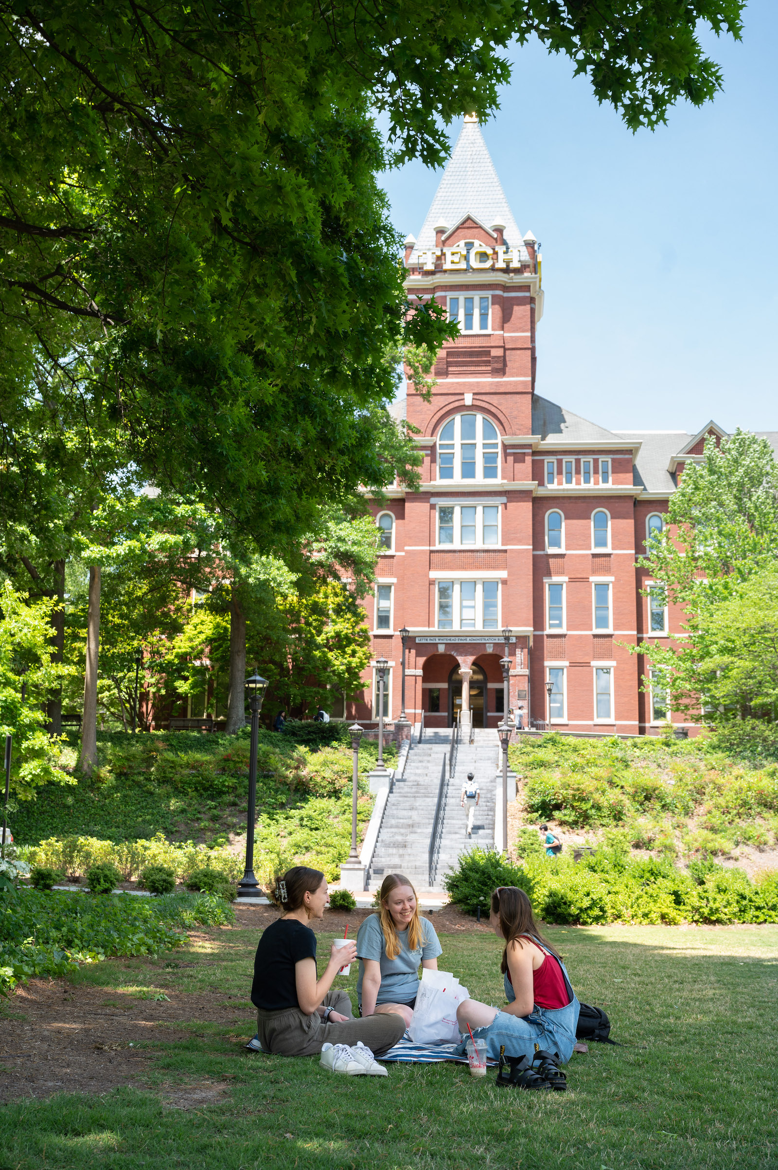 Lydia Kenney, Julia Bush, and Chelsey Odendahl on Tech Lawn. 