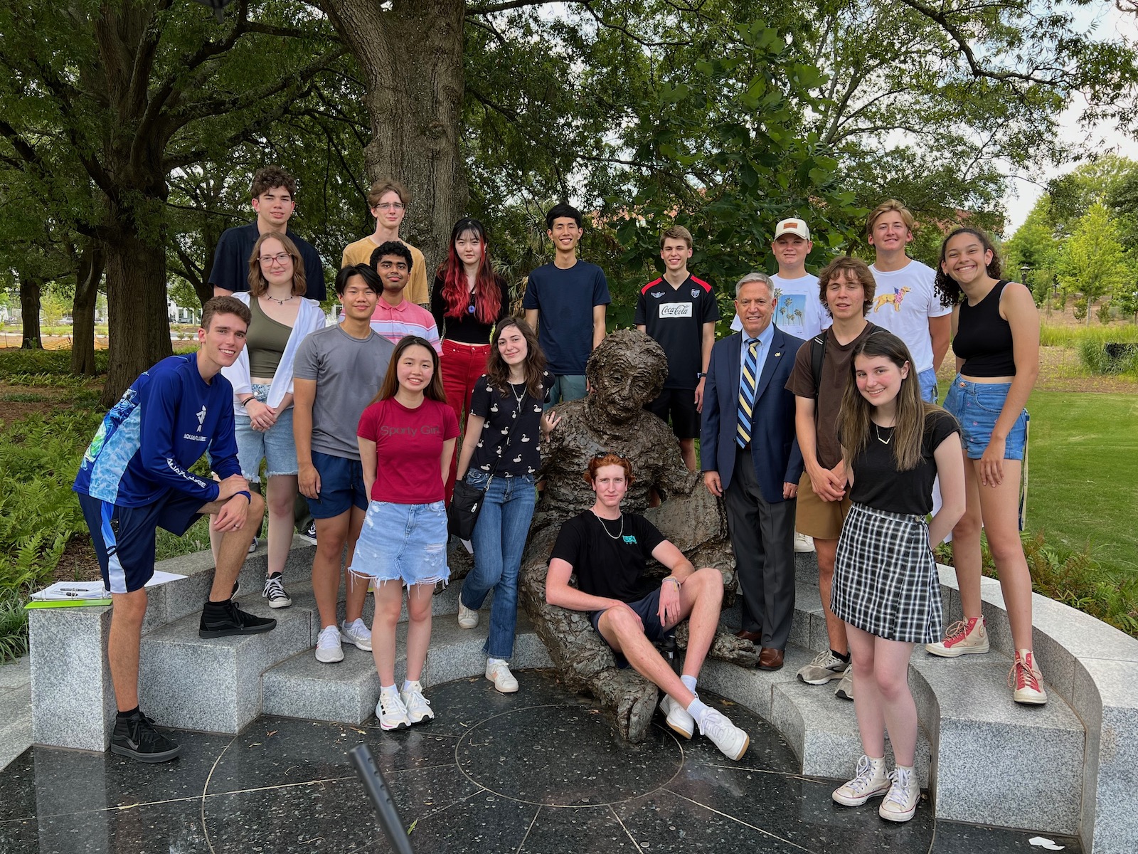 Dean John Stein and students in the First-Year Semester Abroad program at the Einstein Statue. 