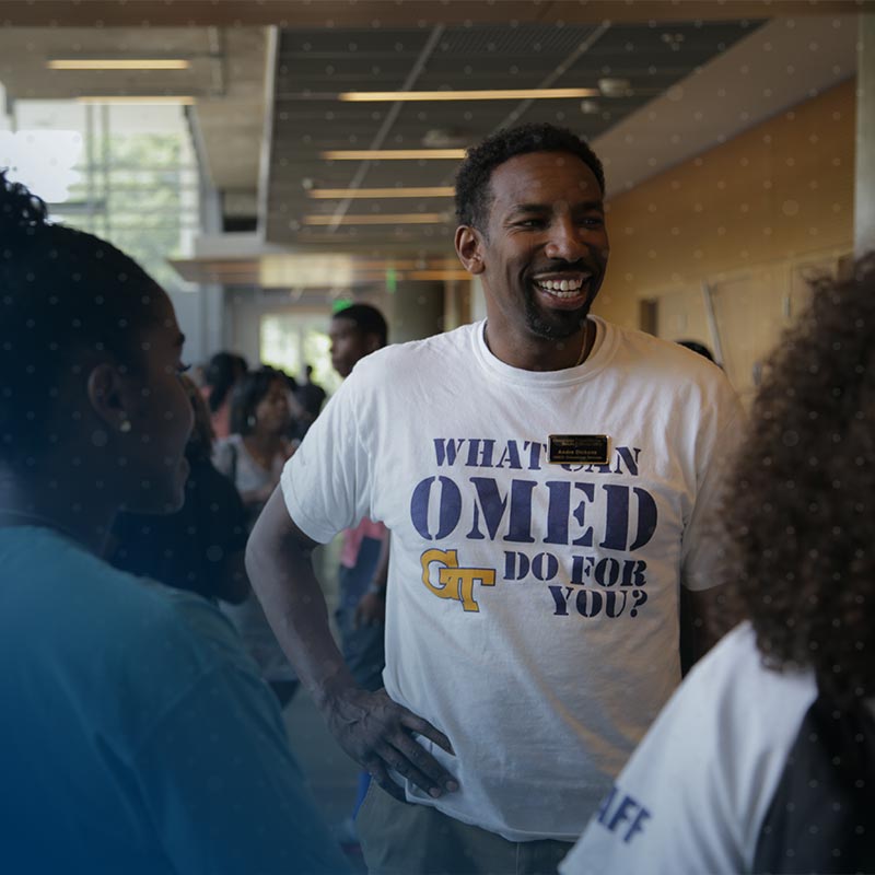 Andre Dickens meeting students