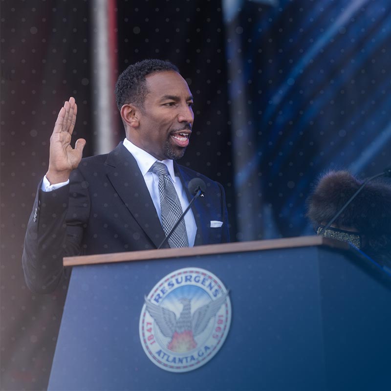 Mayor Dickens taking the oath of office.