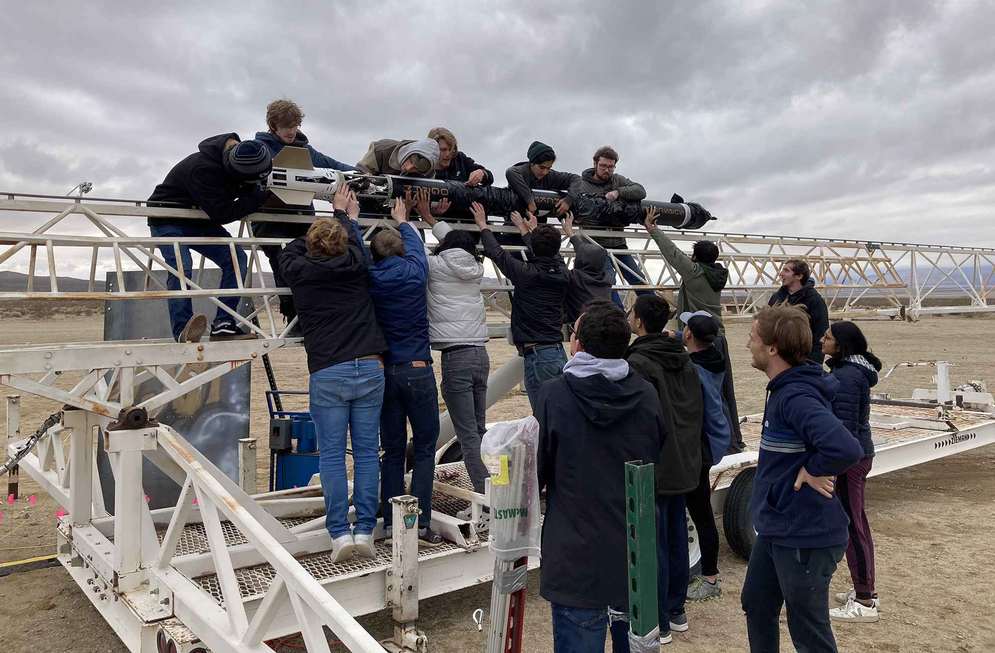 YJSP crew working on the rocket in the days before launch