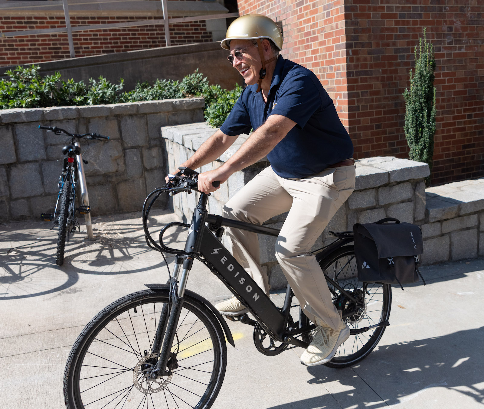 President Cabrera riding his bike on Move-In day. 