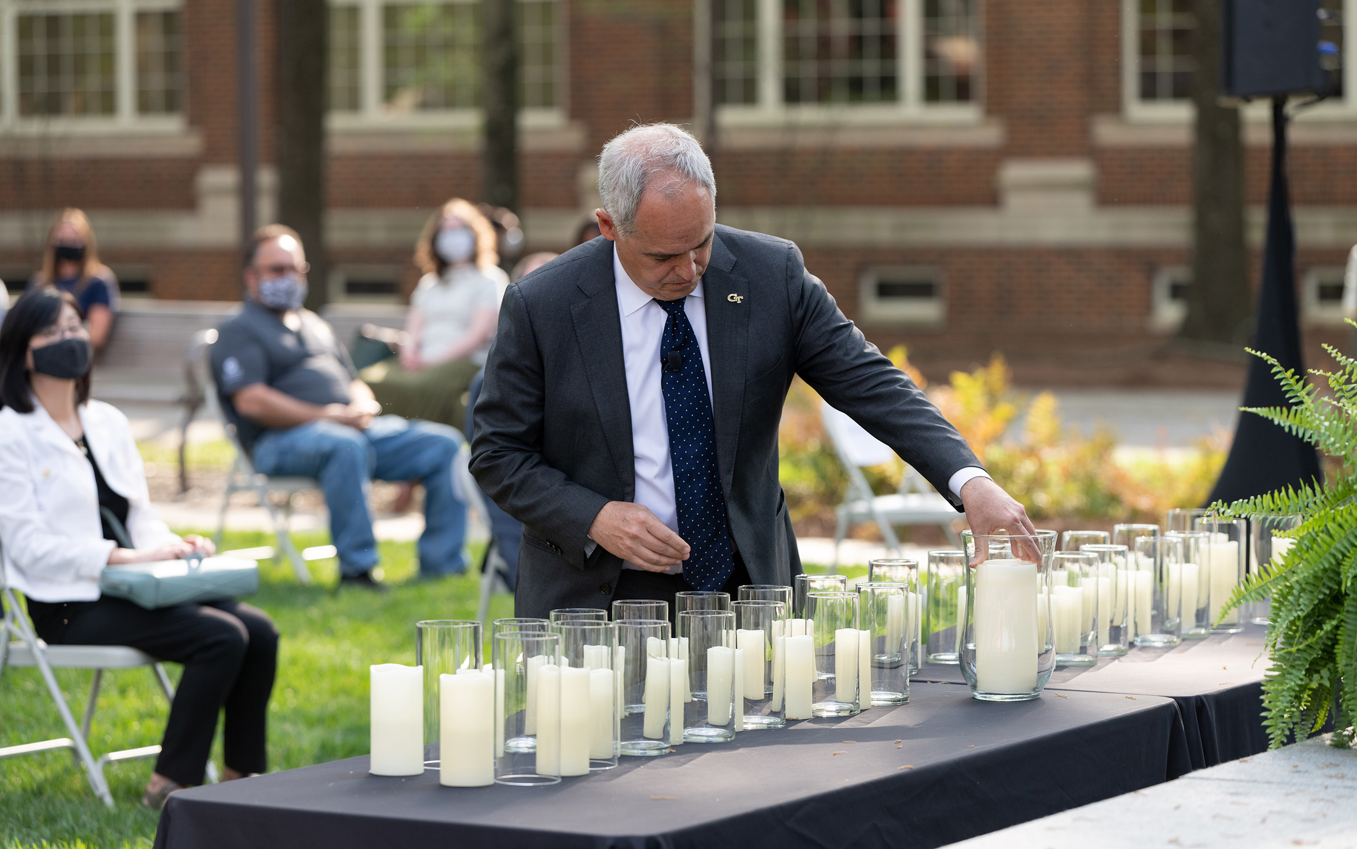 president cabrera lights a candle at when the whistle blows in 2021