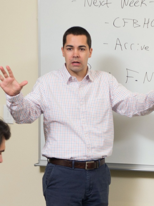 Assistant Professor Johnny Smith teaching class.